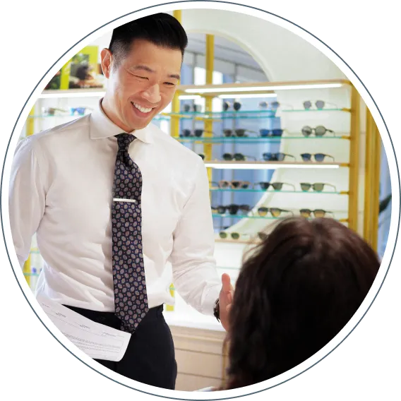 Optometrist consulting patient about eyewear and vision care