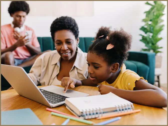 Parent helping child with screen learning and eye health care