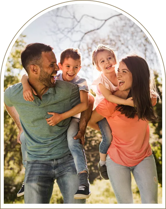 Parents carrying their children outdoors